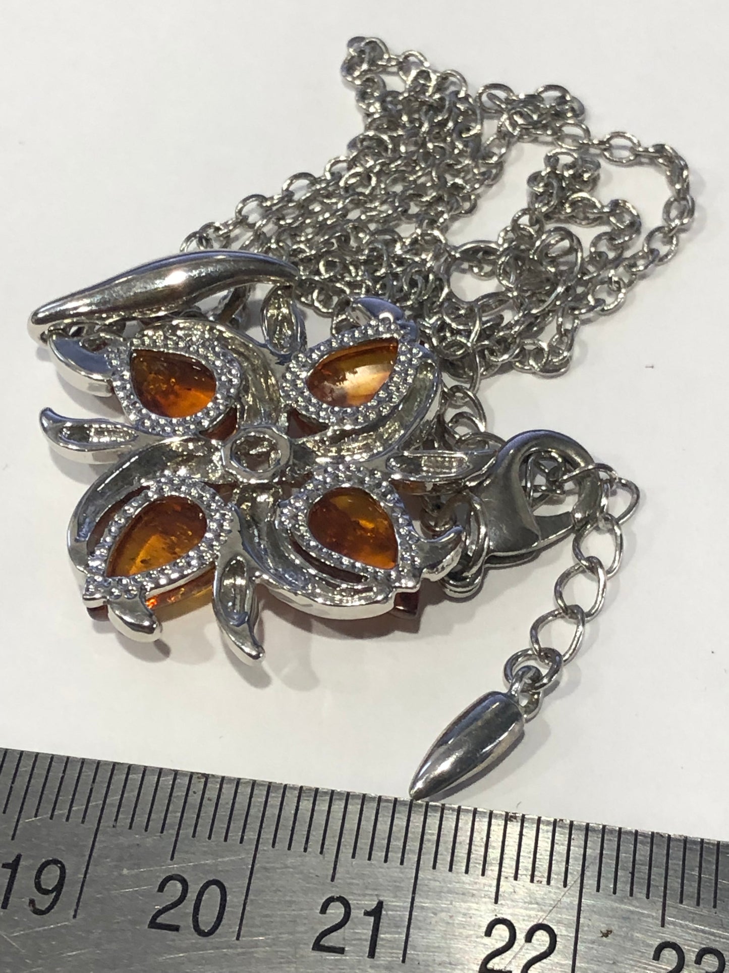 Amber flower pendant necklace silver tone