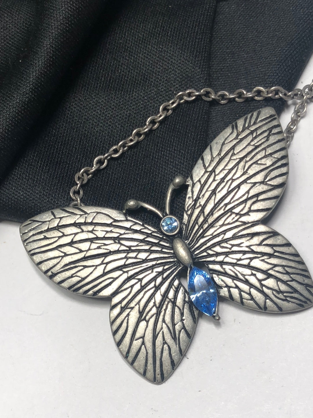 Butterfly pendant necklace blue glass rhinestone pewter tone