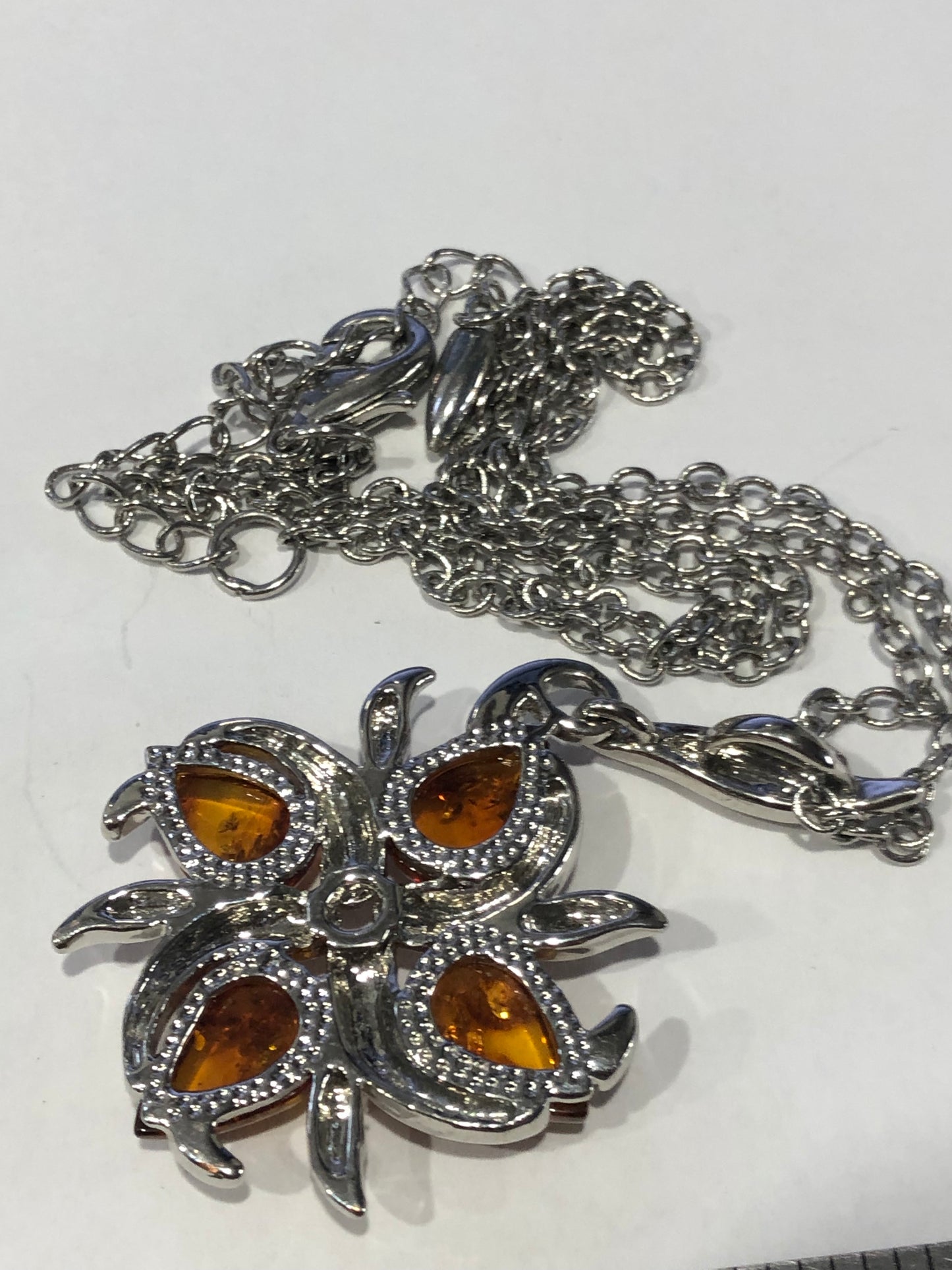 Amber flower pendant necklace silver tone