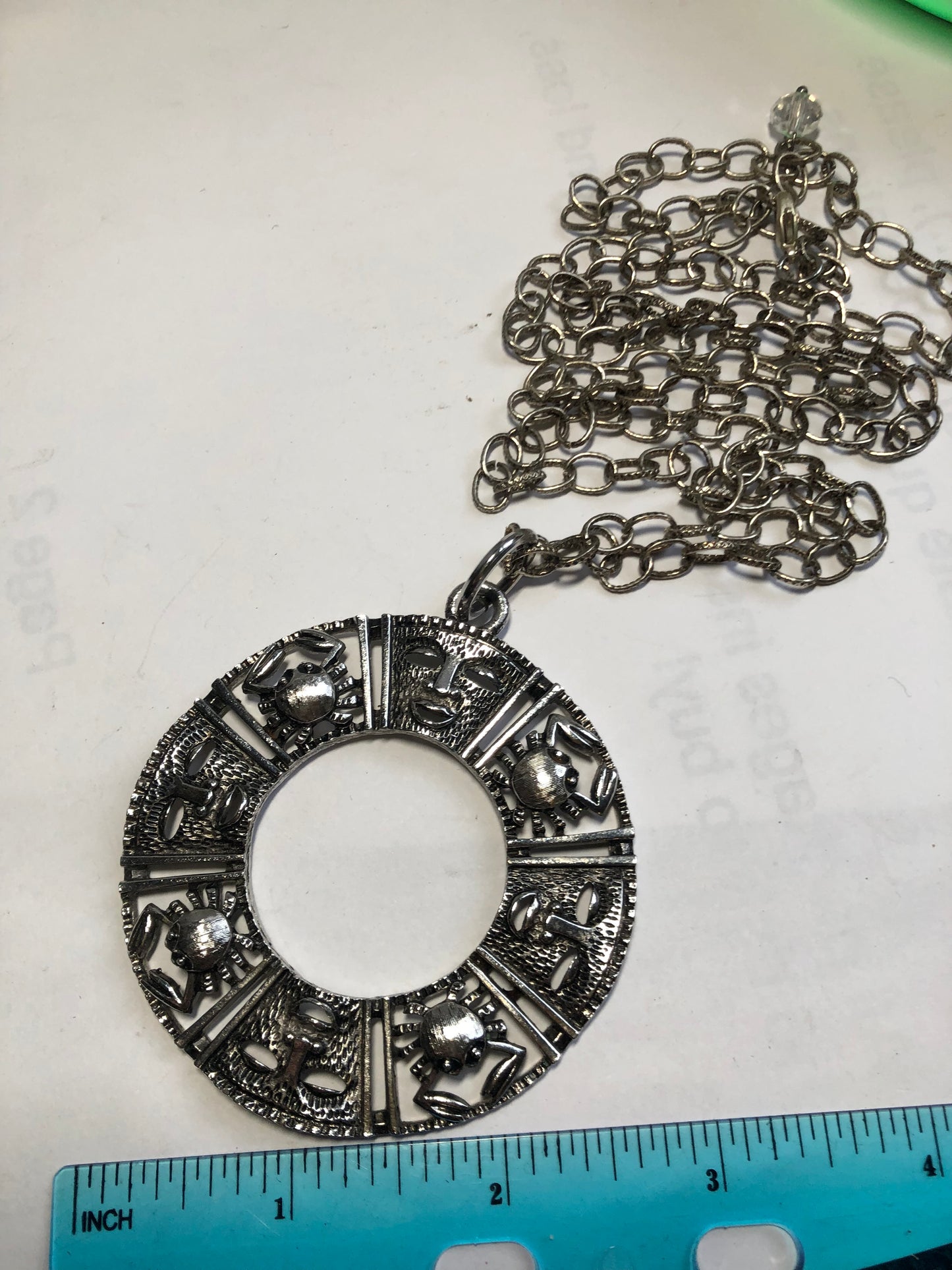 VTG Sarah Coventry Canada Maya or aztec Masks crab round pendant necklace