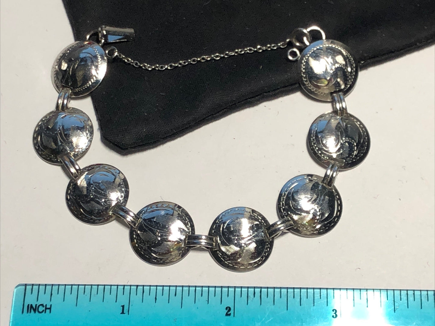 Vintage Sterling silver coin link bracelet mark Bond Boyd floral engraved