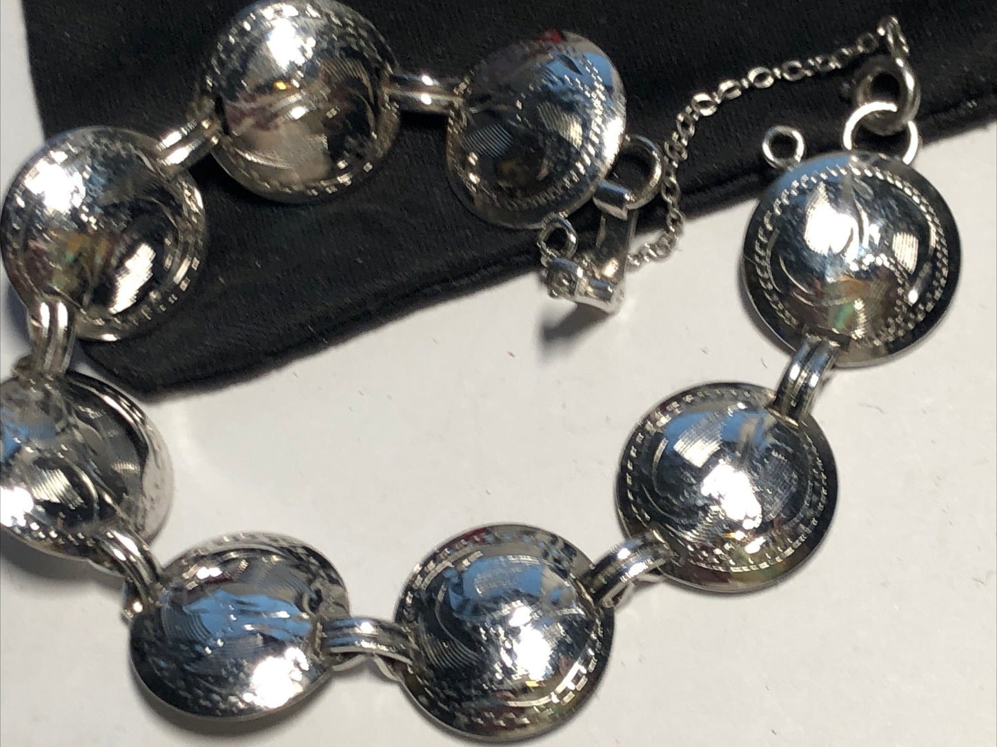 Vintage Sterling silver coin link bracelet mark Bond Boyd floral engraved