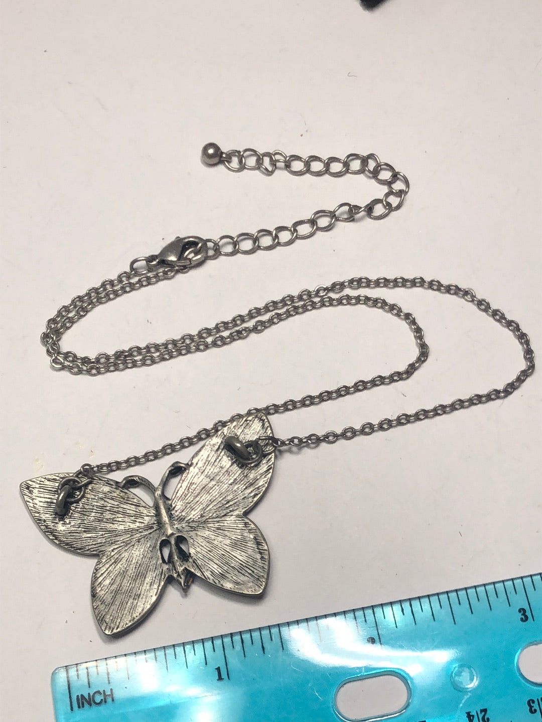 Butterfly pendant necklace blue glass rhinestone pewter tone
